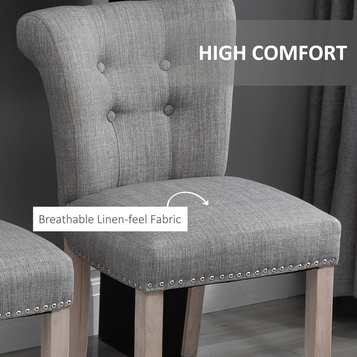 HOMCOM Bar Stools Set of 2, Upholstered Counter Height Stools with Button Tufted Back, Wood Legs and Footrest, Grey