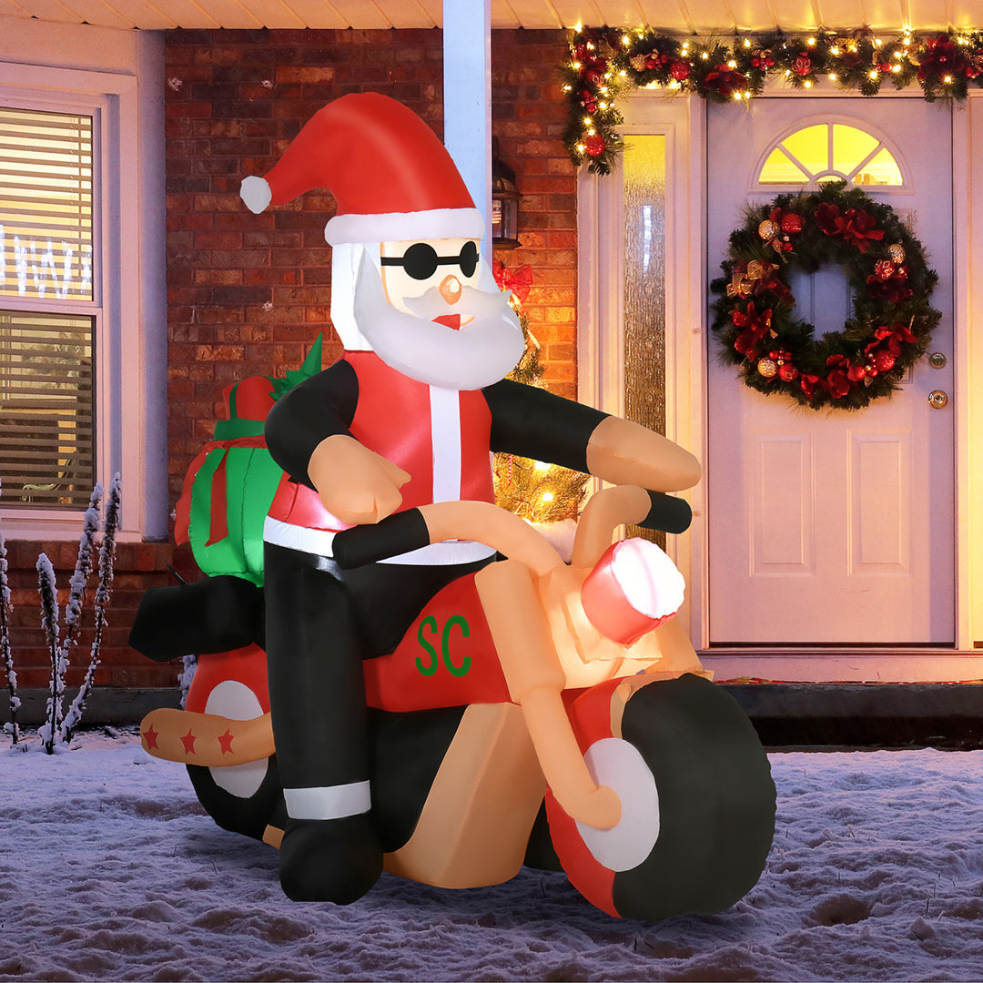 HOMCOM 5.5' H Christmas Holiday Yard Inflatable Outdoor, Light Up LED Decoration, Santa Claus Riding a Motorcycle