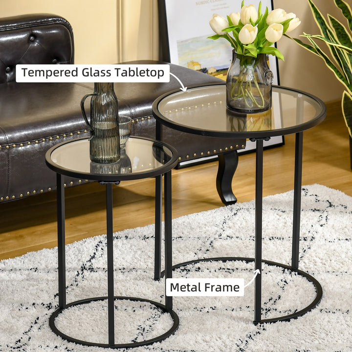 HOMCOM Set of 2 Nesting Coffee Tables with Metal Base, Round Side Table with Tempered Glass Tabletop for Living Room, Bedroom, Black