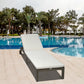 Outsunny Patio Rattan Sun Lounger with 4-Level Adjustable Backrest and Wheels, Wicker Chaise Lounge Chair with Cushion, for Patio, Deck, Poolside Cream White