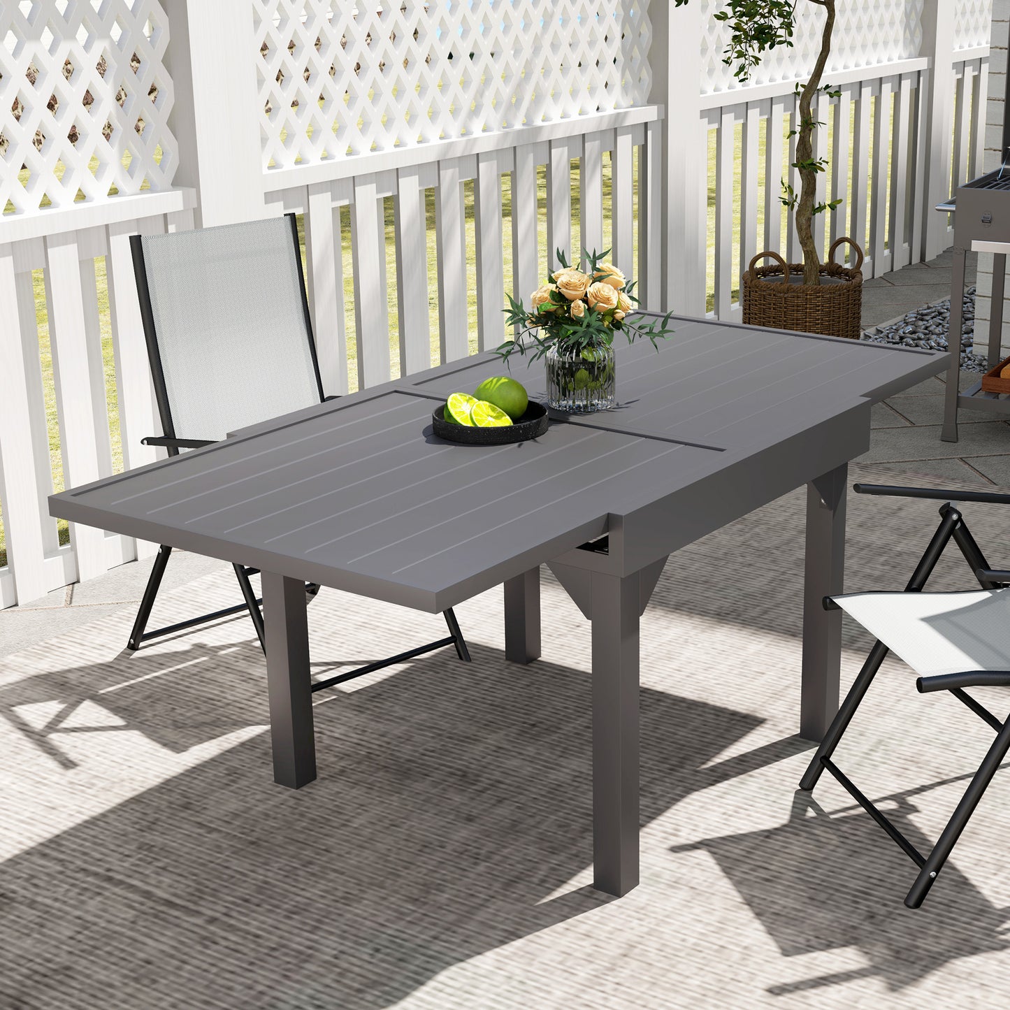 Outsunny 35"-71"  Extendable Aluminium Outdoor Dining Table, Slatted Top Patio Table for 4-6 Person, for Garden, Backyard, Grey
