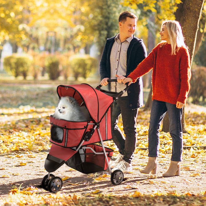 PawHut 3 Wheels Foldable Dog Stroller with Storage Basket, Adjustable Canopy, Cupholder for Miniature and Small Dogs, Red