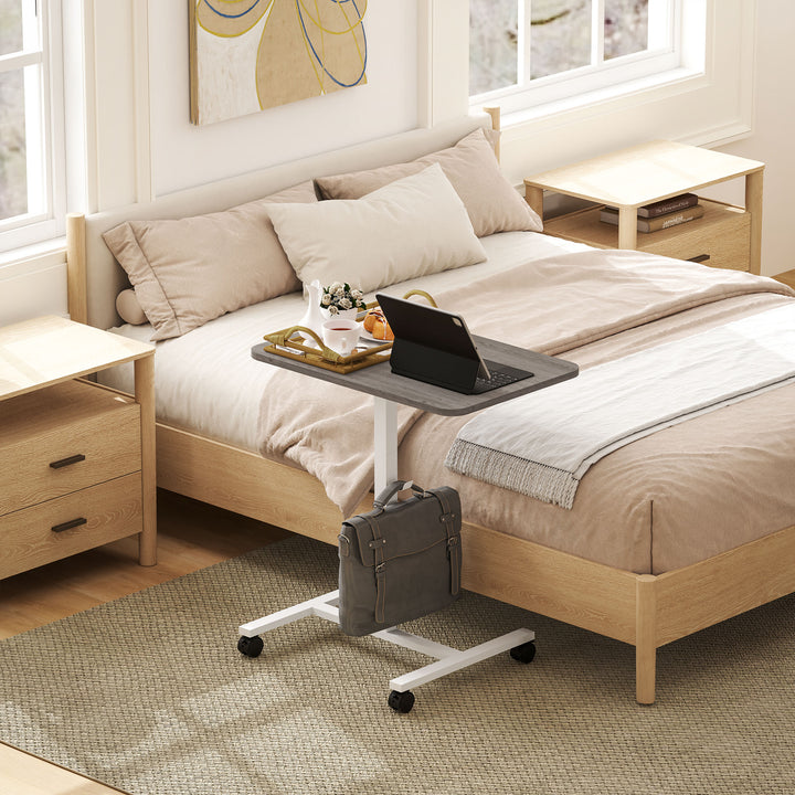 HOMCOM Height Adjustable Standing Desk, Pneumatic Sit Stand Desk with Wheels and Headphone Hook for Home Office, Natural