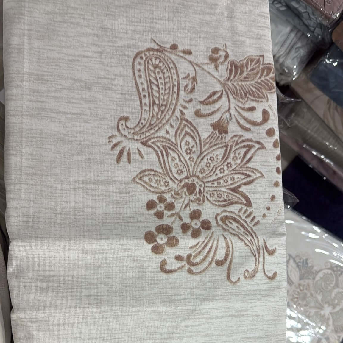 Aarniva cotton paisley bedsheet set with soft taupe paisley print on a light background, showcasing elegant floral designs.