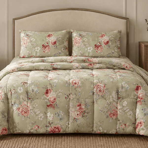 Aarniva breathable polyester sage rose garden comforter set on a bed in soft sage color with floral design.
