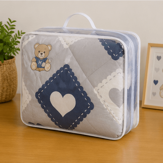 Aarniva breathable teddy comforter set in storage bag, featuring soft grey design with heart patterns and teddy bear.