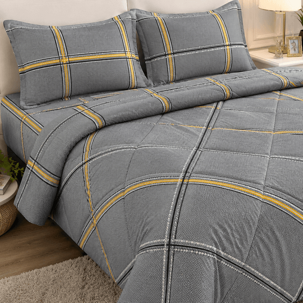 Aarniva breathable polyester comforter set in deep grey with yellow plaid design on a bed.