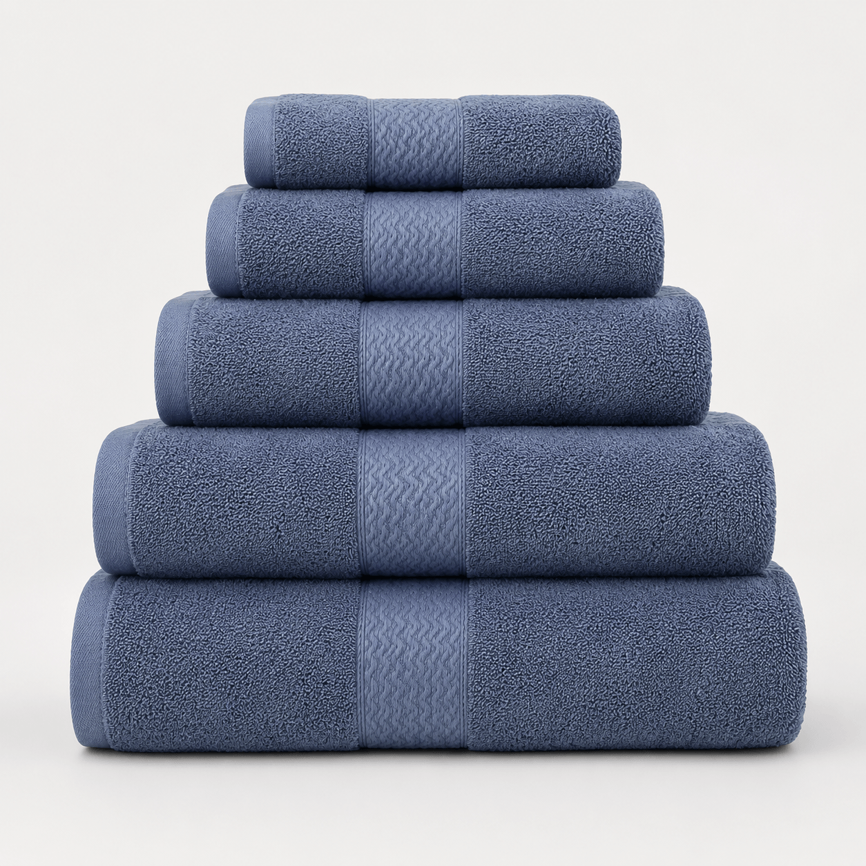 Aarniva cotton jacquard towel set in blue, 5-piece thick and absorbent towels stacked for bathroom use.