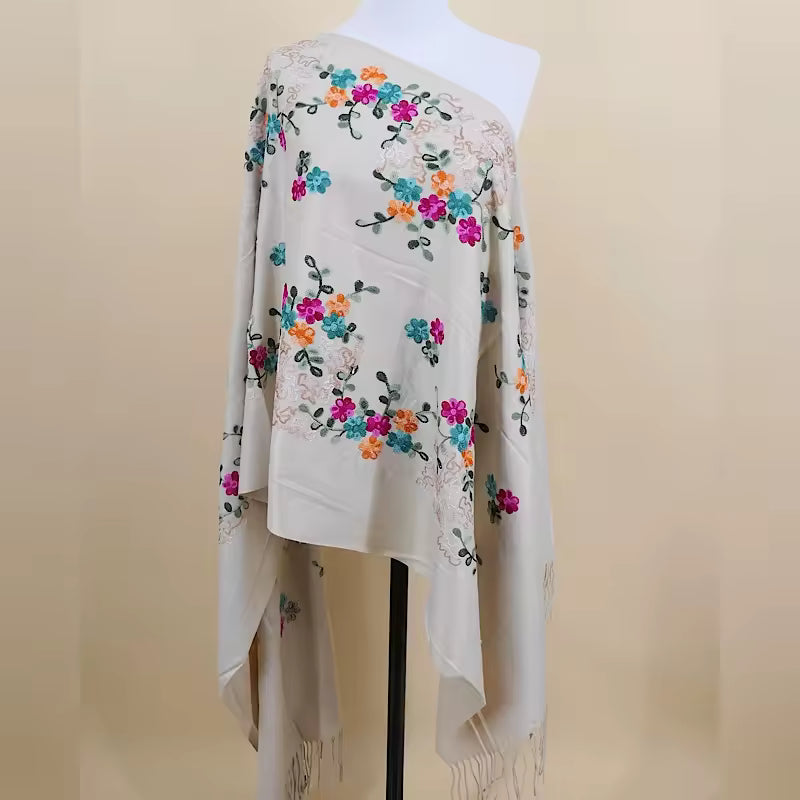 Aarniva Embroidered Faux Cashmere Shawl in beige with floral tassel design, soft thick fabric for warmth and style.