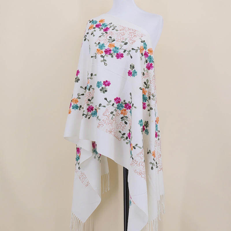 Aarniva Embroidered Faux Cashmere Shawl | Long Warm Wrap Scarf | Soft & Thick Fabric | Floral Tassel Design | Ethnic Style displayed on a mannequin.