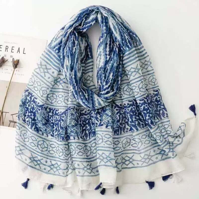 Aarniva ethnic leaf print travel shawl in navy blue and white, lightweight breathable scarf for travel and outdoor wear.