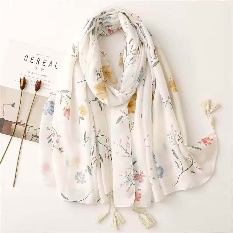Aarniva ethnic leaf print travel shawl in ivory floral design, lightweight breathable fabric, perfect for travel and sunny days.