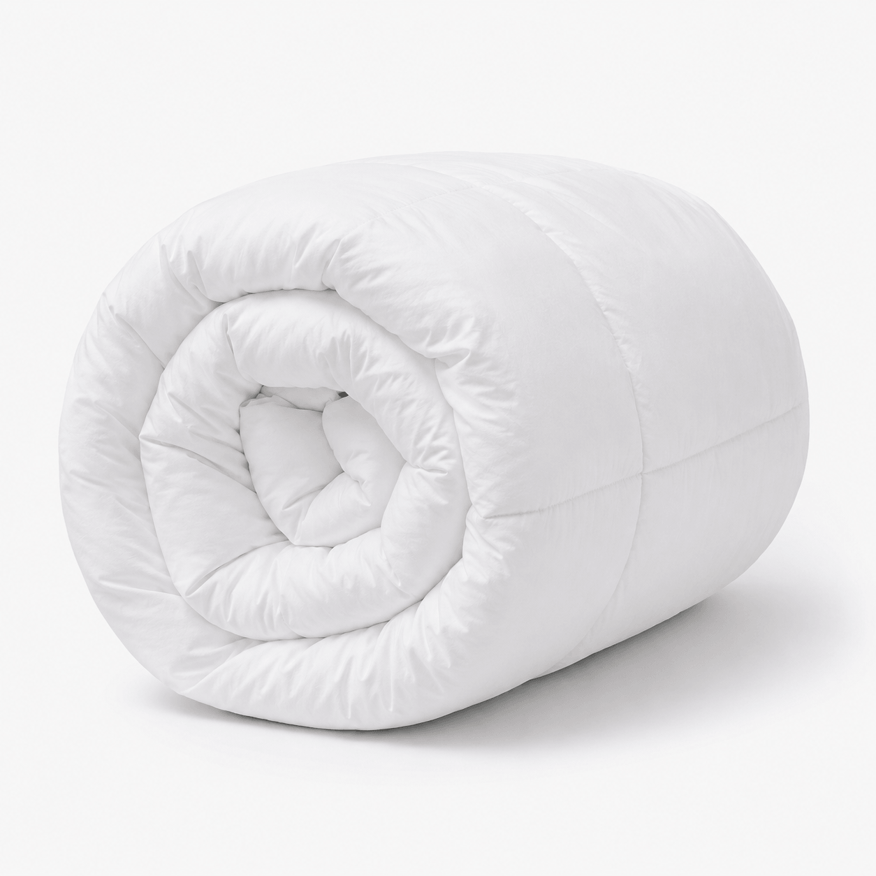 Aarniva Hotel Comforter rolled up in classic white, showcasing luxury hotel comforter design for home elegance.