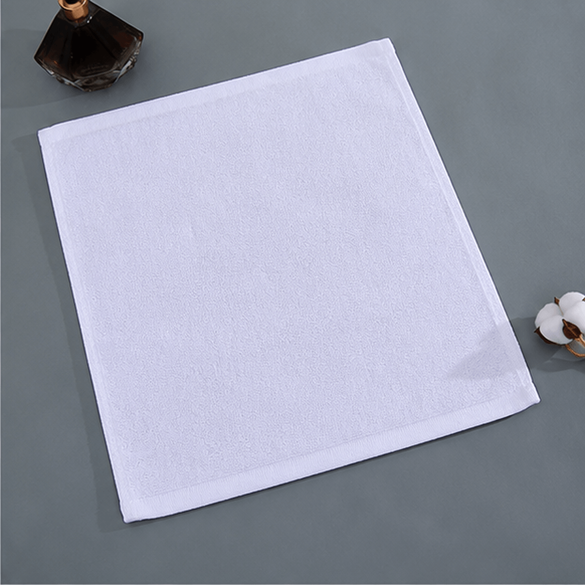 Aarniva Jacquard Cotton Hotel Face Towels in classic white, soft and absorbent, perfect for daily cleansing routines.
