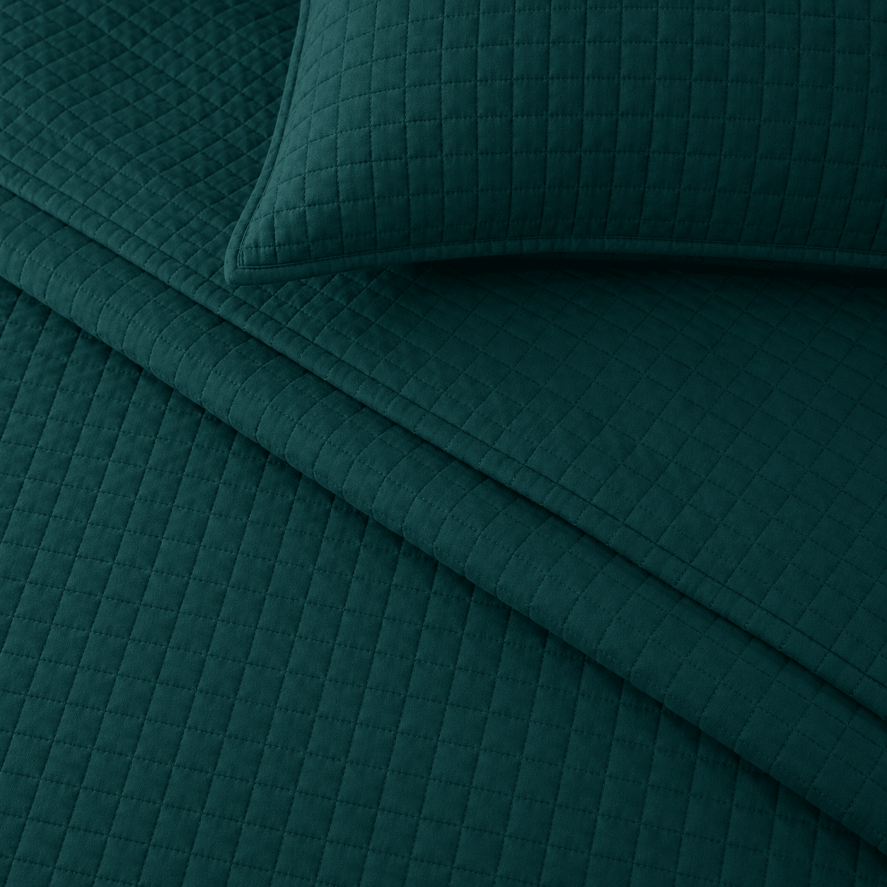 Aarniva Quilted Bedding in deep teal, soft lightweight quilted bedding queen set, featuring a modern stitched grid pattern.