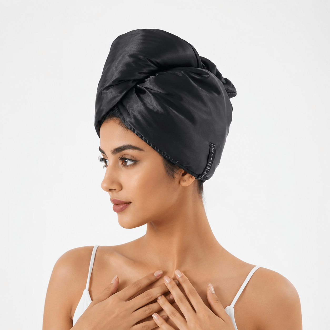 Aarniva Satin Microfiber Hair Drying Turban in glossy black, showcasing a stylish and comfortable hair wrap.