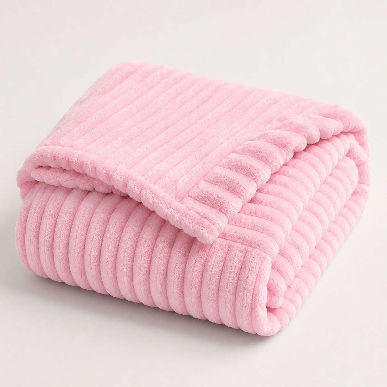 Aarniva Soft Flannel Throw Blanket in baby pink color, featuring ribbed texture for cozy comfort.
