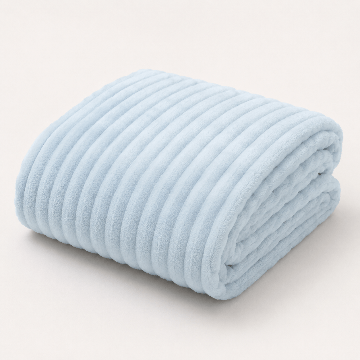 Aarniva Soft Flannel Throw Blanket in ice blue with ribbed texture, ultra-soft and cozy for home decor.