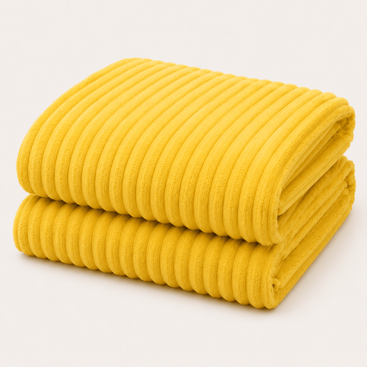 Soft flannel throw blanket in sunshine yellow with ribbed texture, perfect for cozy comfort and modern style.