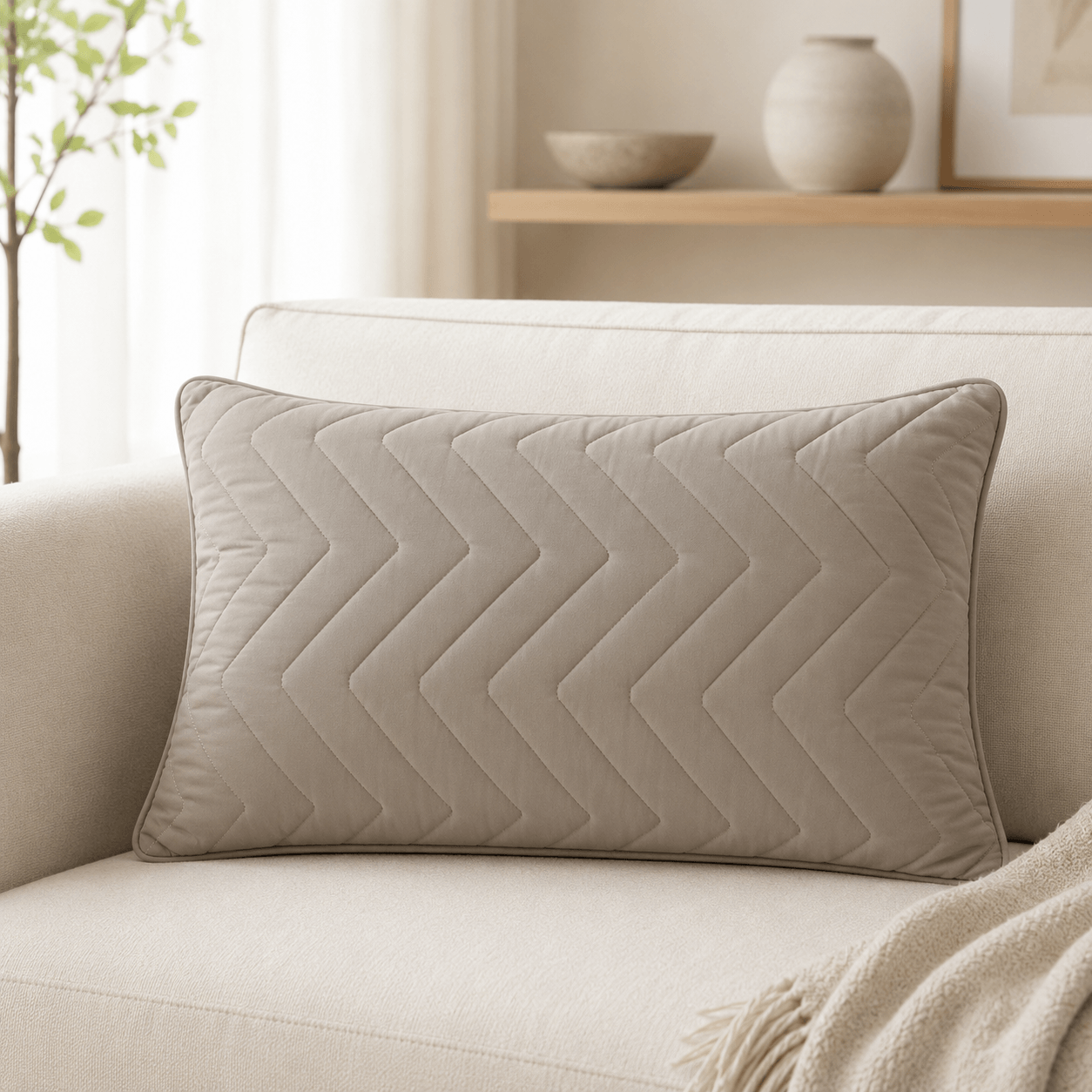 Aarniva Zigzag Quilted Pillow | 27 x 17 in | Soft Microfiber Fill | Plush & Supportive | Solid Colour Design | 1-Piece on a sofa.