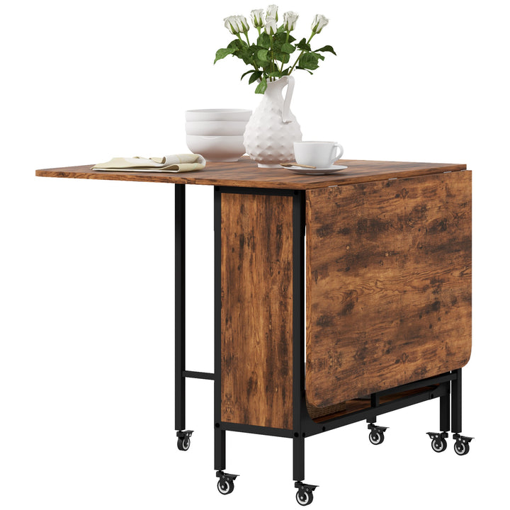 HOMCOM Folding Dining Table, Extendable Kitchen Table for Small Spaces with Storage Shelf and 6 Wheels, Light Brown