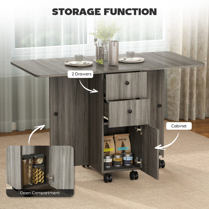 HOMCOM Foldable Dining Table, Rolling Kitchen Table with Storage Drawers and Cabinet, Drop Leaf Table on Wheels, Grey