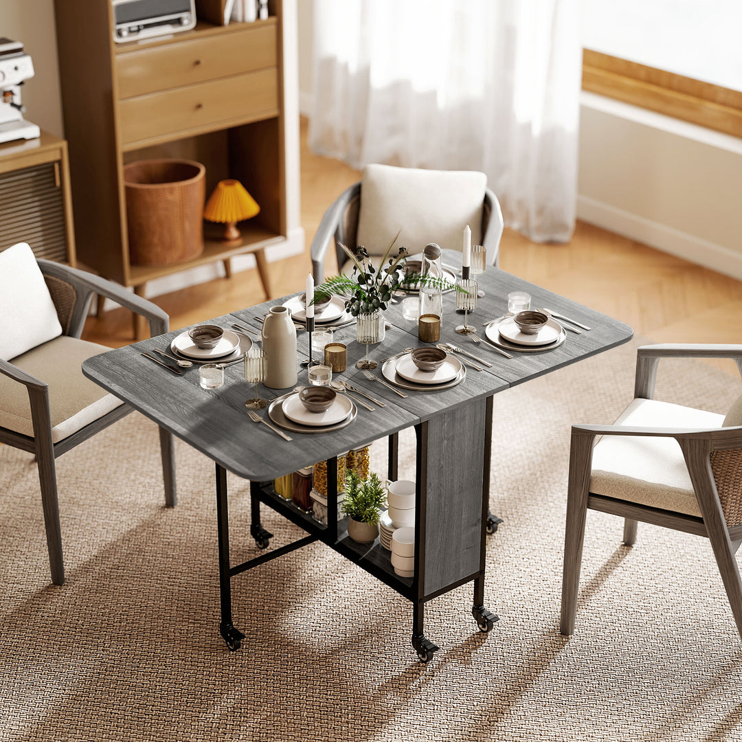 HOMCOM Folding Dining Table, Extendable Kitchen Table for Small Spaces with Storage Shelf and 6 Wheels, Light Brown