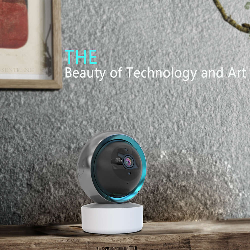 TRIDENT Tuya Smart Security Camera 2MP Indoor Motion Tracking Voice Intercom Security Wireless WiFi Smart Camera on a wooden surface.